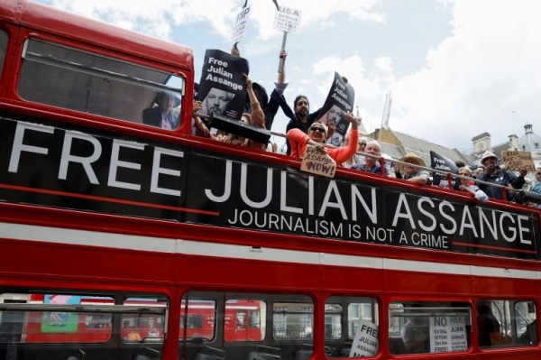 Free Julian Assange Campaign. [AP]